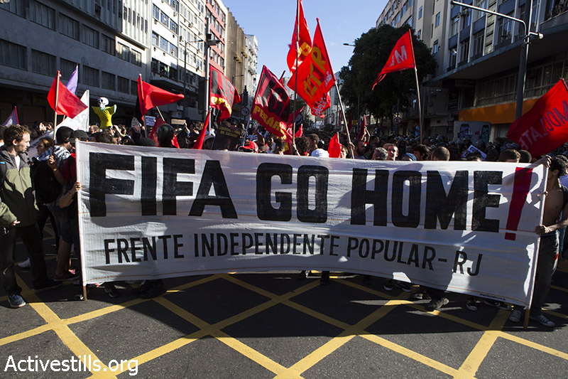 הפגנה נגד גמר גביע העולם בכדורגל, ריו דה-ז׳נרו, ברזיל, ה-13 ליולי, 2014, קרן מנור/אקטיבסטילס