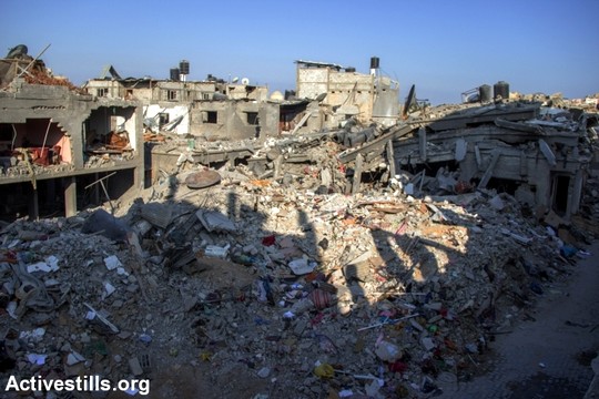 הרס וחורבן בבית חאנון, רצועת עזה 12 באוגוסט 2014 (באסל יאזורי/אקטיבסטילס)