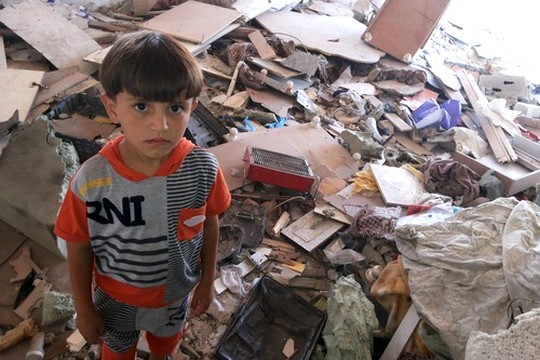 מחמד אבו ג'ארד, בן 10, שאיבד את הוריו, אחיו ואחותו (עאוני פרחאת)
