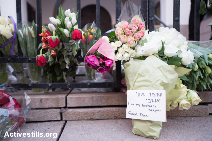 אוסלו: מוסלמים הביאו פרחים לזכר דן אואן, המאבטח שנרצח בדנמרק (ריאן רודריק ביילר / אקטיבסטילס)