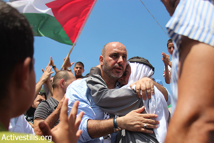 נאסר ברדאן, אסיר פלסטיני תושבי ישראל, מבורך ביום שחרורו, הכפר ערערה, 11 אוגוסט, 2015. (עומר סאמיר / אקטיבסטילס)