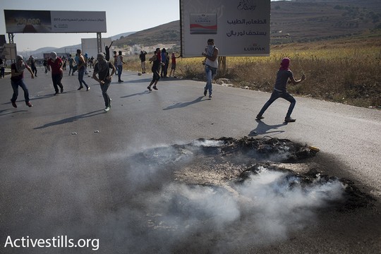 עימותים בין פלסטינים לכוחות הביטחון לאחר הלווייתו של הפעוט עלי דוואבשה. צילום: אורן זיו/אקטיבסטילס