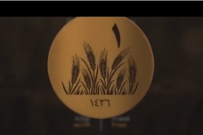 דינר הזהב של דאע"ש. עיצוב בהשראת פסוקים מהקוראן, עם ציורים של מקומות מרכזיים המזוהים עם האסלאם. 