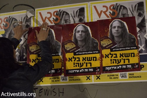 תליית פוסטר נגד אמיר חצרוני, תל אביב, 23.3.15