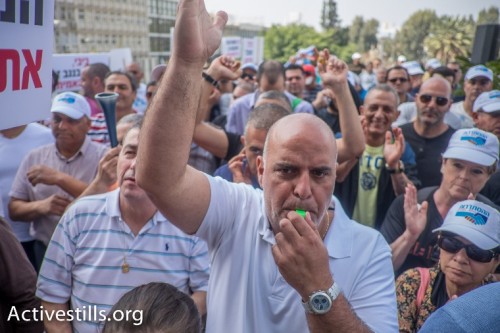 הפגנת עובדי כי"ל במשרדי החברה בתל אביב (יותם רונן / אקטיבסטילס) הפגנת עובדי כי"ל במשרדי החברה בתל אביב (יותם רונן / אקטיבסטילס)