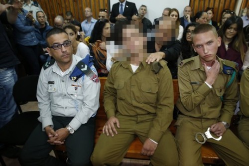החייל היורה מחברון בדיון הארכת מעצר (AFP/POOL) החייל היורה מחברון בדיון הארכת מעצר (AFP/POOL)