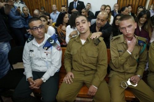 אלאור אזריה, החייל היורה מחברון, בדיון הארכת מעצר (AFP POOL) אלאור אזריה, החייל היורה מחברון, בדיון הארכת מעצר (AFP POOL)