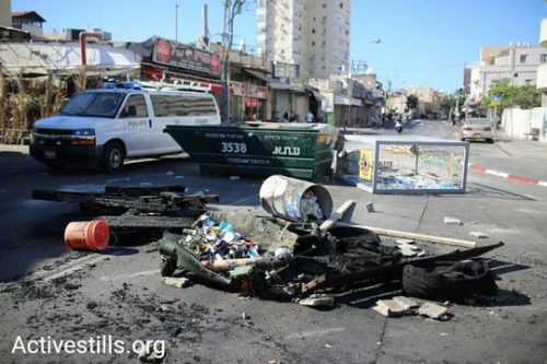 רחוב יפת ביפו לאחר הפגנת זעם של תושבים בעקבות מותו של תושב העיר בן 20 מירי של שוטרים (אורן זיו/אקטיבסטילס)