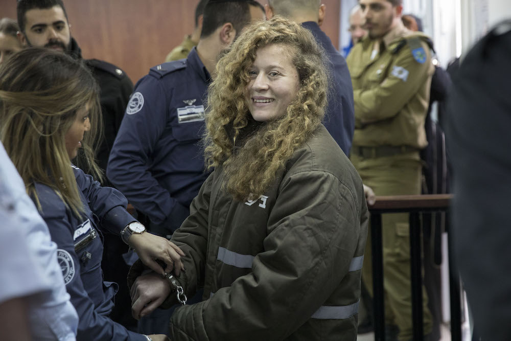 עהד תמימי בבית המשפט הצבאי שבכלא עופר, במהלך משפטה, ינואר 2018 (צילום: אורן זיו)