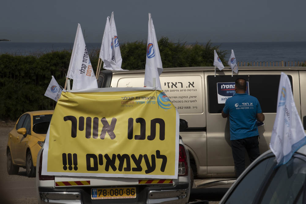 מחאת העצמאיים בתל אביב, בהתארגנות ליאצה בשיירה לכנסת, 30 במרץ 2020 (צילום: אורן זיו)