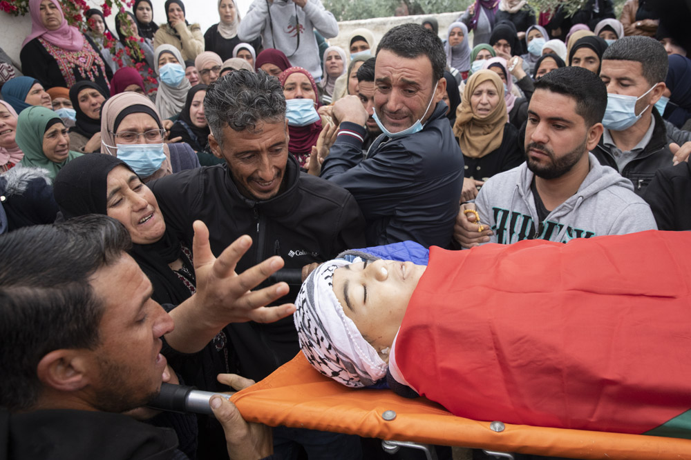 הלוויתו הילד הפלסטיני עלי אבו עליא בכפר אל מוע'ייר שבגדה המערבית (צילום: אורן זיו)