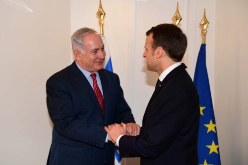 ראש הממשלה בנימין נתניהו ונשיא צרפת עמנואל מקרון, ב-2018 (צילום: עמוס בן גרשום / לע"מ)