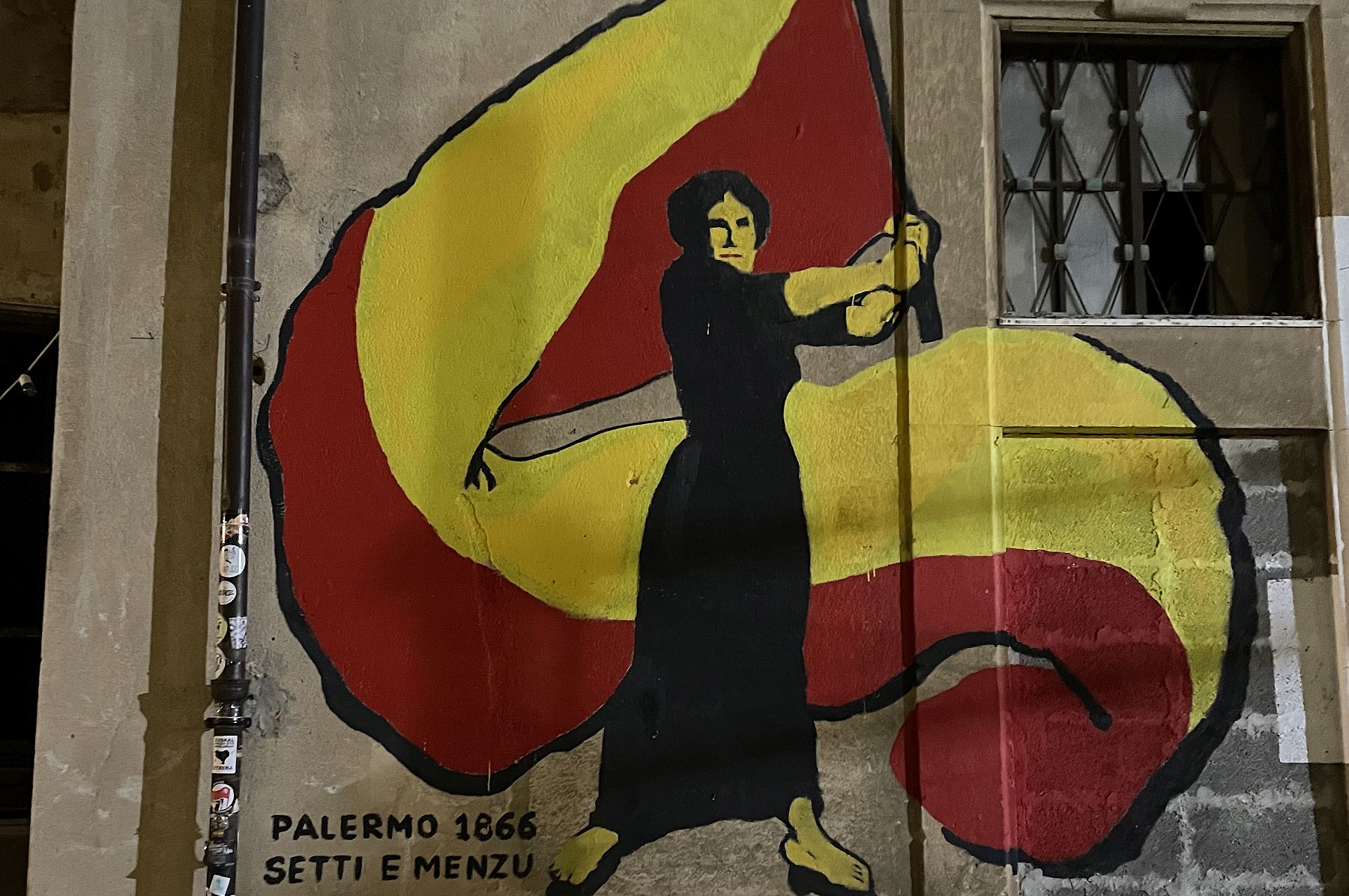 הסיפוח של סיציליה לאיטליה עדיין משפיע עליה לרעה. ציור קיר בפלרמו המציין את המרד נגד הסיפוח האיטלקי ב-1886 (צילום: מתן מוריסון)