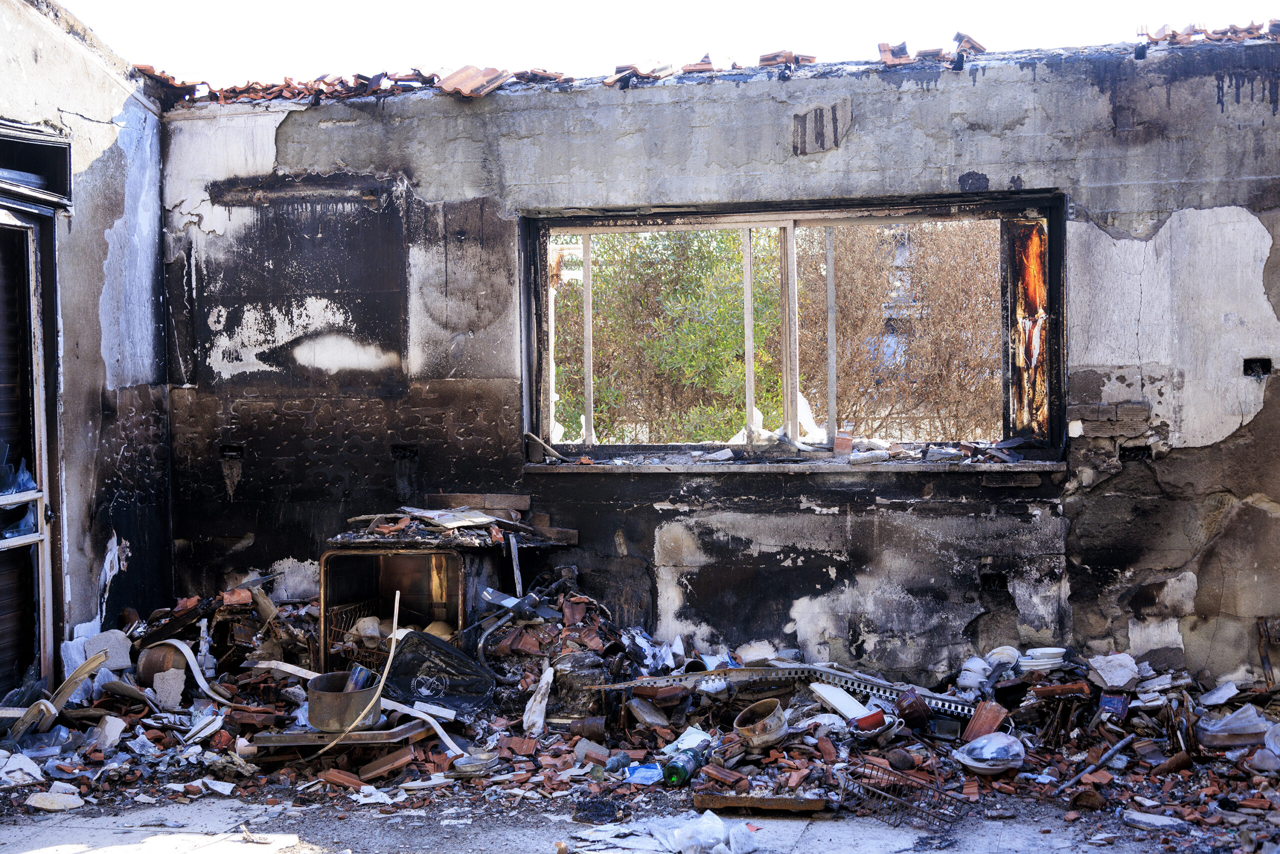 האווירה אחרי הטבח של 7 באוקטובר היתה כואבת ונקמנית. בית הרוס בקיבוץ בארי (צילום: משה שי / פלאש 90)